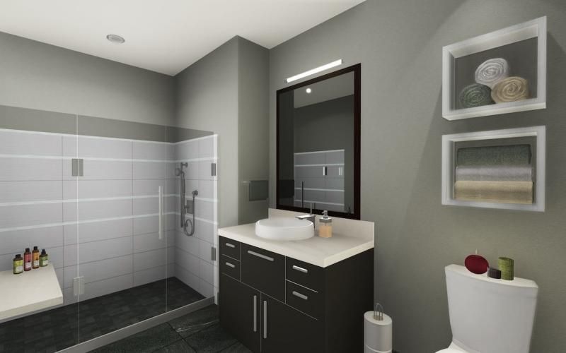 a bathroom with a sink, shower and a toilet